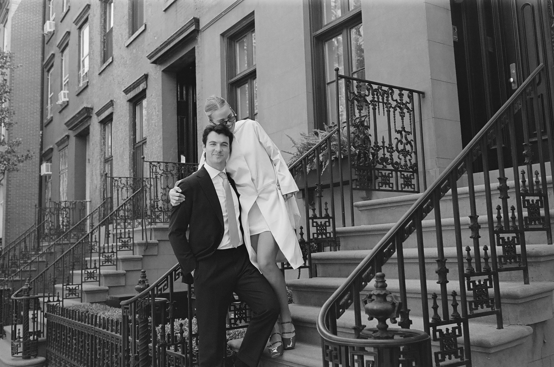 Tara and Marcus on a New York brownstone stoop